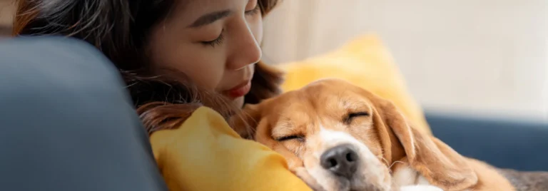 Woman holding her ESA dog